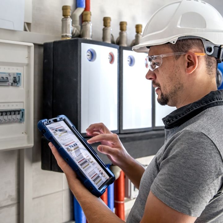electric panel being inspected during a pre-purchase home inspection in florida